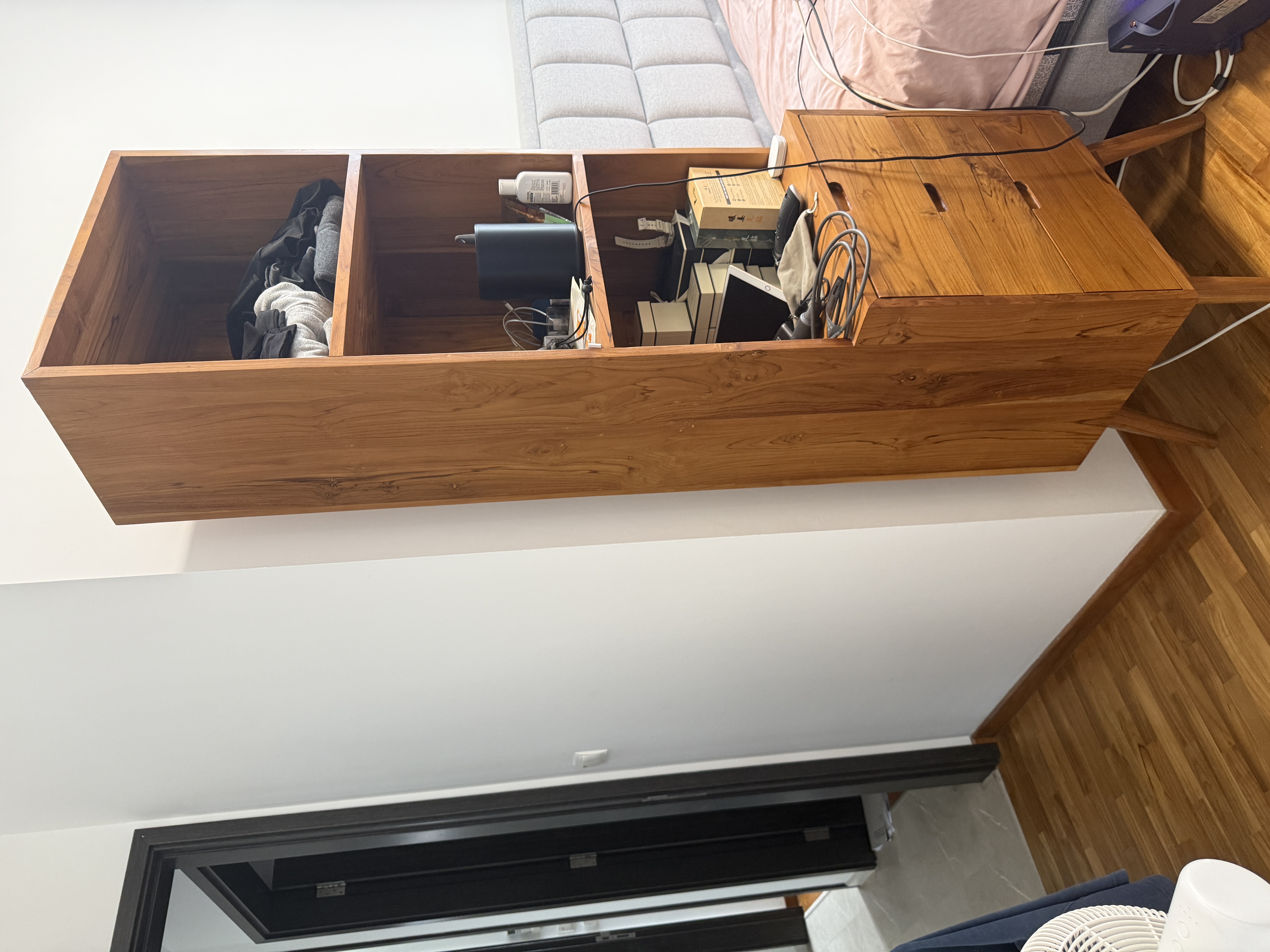 Tall teak display cabinet